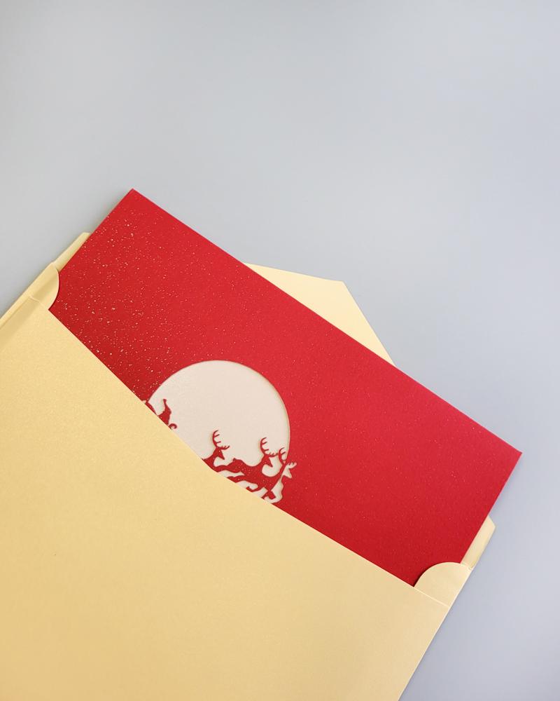 Santa's Sleighride 3D Pop-Up Card inside of open envelope