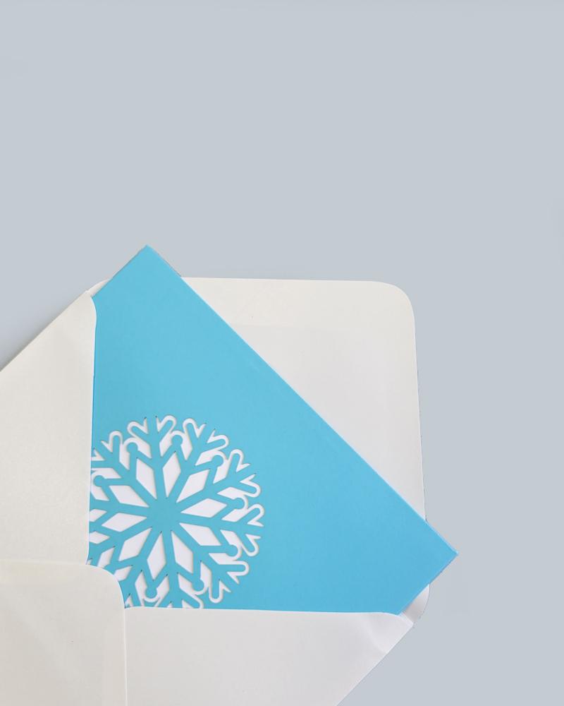 Snowflake 3D Pop-Up Card inside of open envelope