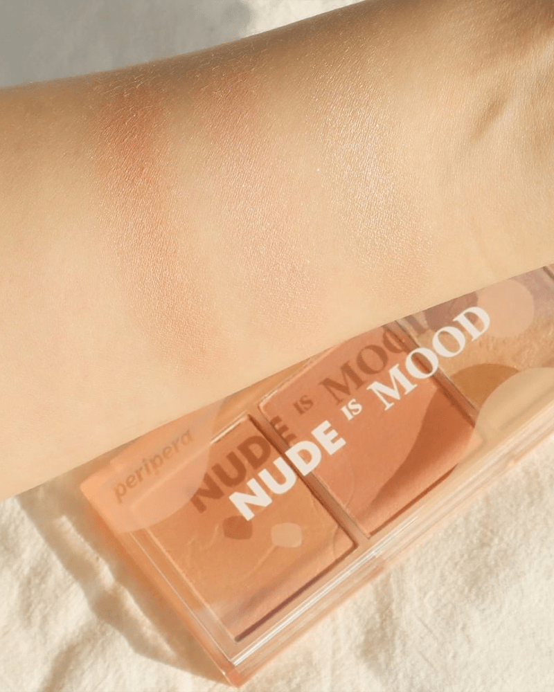 Swatches of Peripera All Take Mood Cheek Palette in Nude is Mood on arm