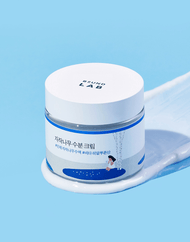 ROUND LAB Birch Juice Moisturizing Cream tub on trail